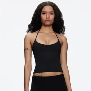 Tank air spill halter